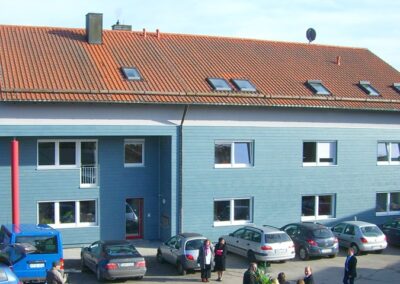 Fassadenbekleidung und Windschutz